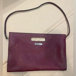 Red wine color Michael Kors clutch purse